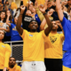 From left to right: Pitt basketball players Jaland Lowe, Marlon Barnes, Papa Amadou Kante, Ishmael Leggett, and Guillermo Diaz Graham at the Pitt volleyball game.